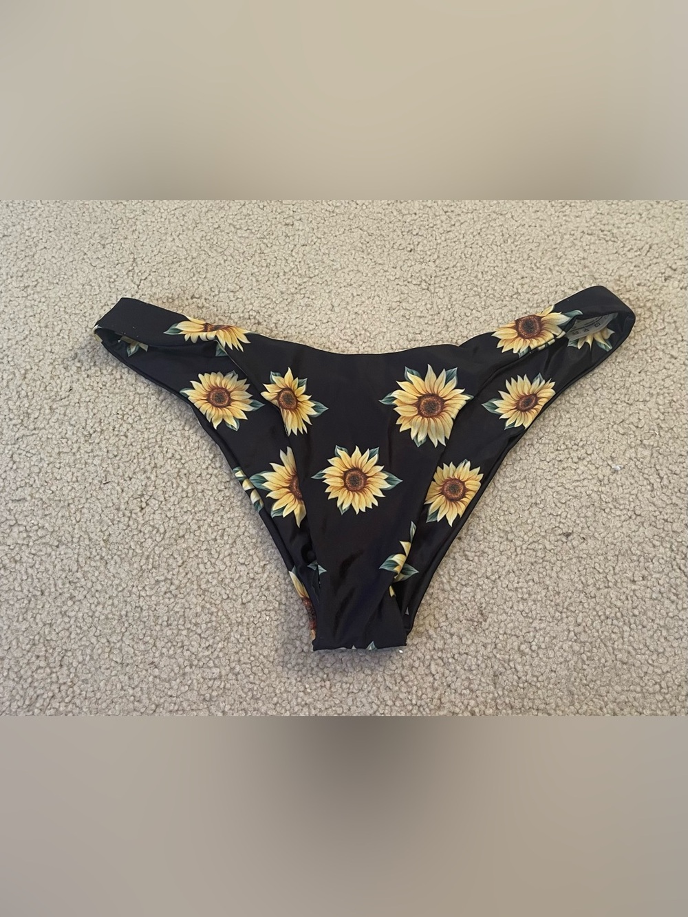 Large Zaful Sunflower Black Bikini Bottom 
Cheeky style
With sanitary sticker